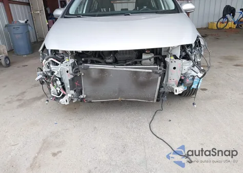 2022 Toyota Prius Prime Le from USA, damaged, VIN JTDKAMFP5N3212691